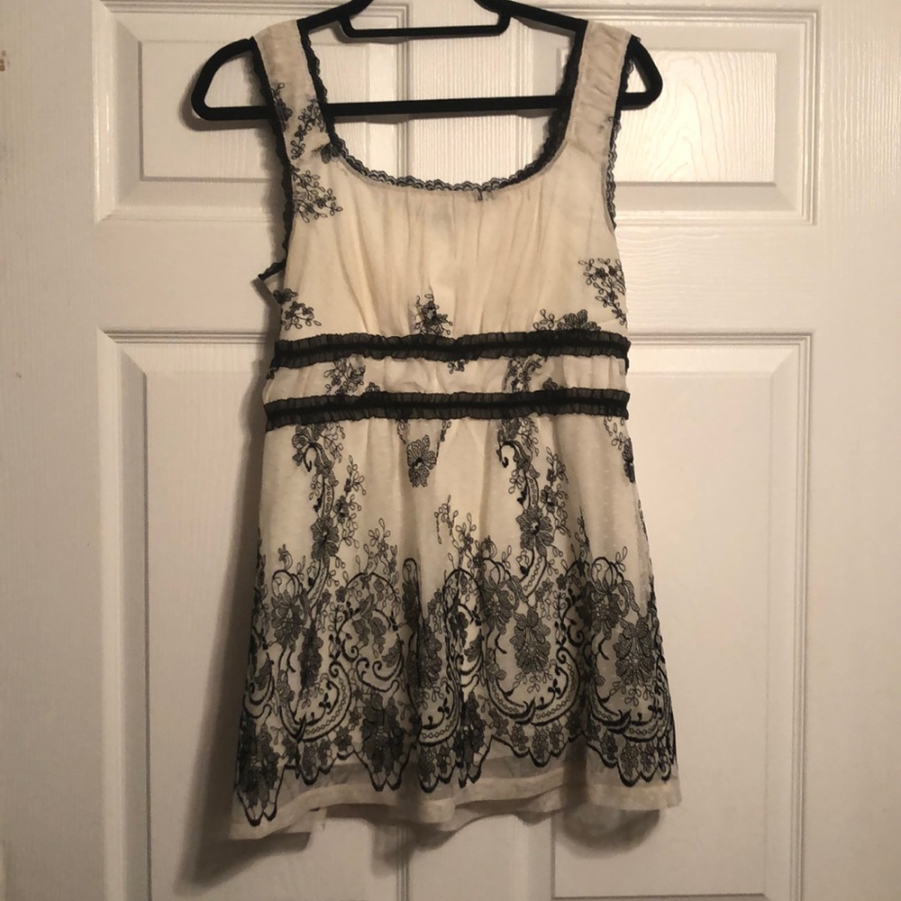 Maurice’s cream and black tank top !